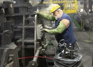 Employee making Mechanical Steel Tubing at Bull Moose Tube Employee making Mechanical Steel Tubing at Bull Moose Tube
