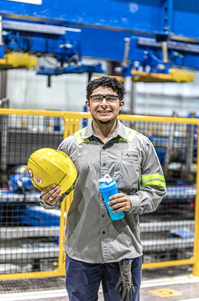 Bull Moose Employee holding hat and water jug
